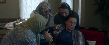 Movie still from “Mustang” (2015), directed by Deniz Gamze Ergüven – A group of women standing next to each other in a room; Medium shot, High angle