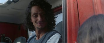 Movie still from “Mustang” (2015), directed by Deniz Gamze Ergüven – A person with long curly hair; Close Up shot, Over the shoulder angle