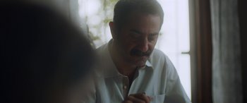 Movie still from “Mustang” (2015), directed by Deniz Gamze Ergüven – A person with a beard and mustache; Close Up shot, Low angle