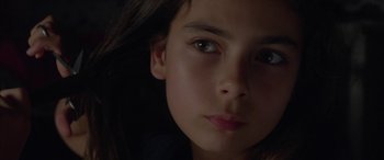 Movie still from “Mustang” (2015), directed by Deniz Gamze Ergüven – A young girl's face in the dark; Close Up shot, High angle