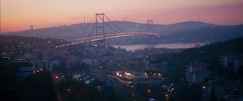 Movie still from “Mustang” (2015), directed by Deniz Gamze Ergüven – A view of a bridge and a city at night; Extreme Wide shot, High angle