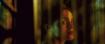 Movie still from “My Blueberry Nights” (2007), directed by Kar-Wai Wong – A young woman looking out of a window at night; Close Up shot, Low angle