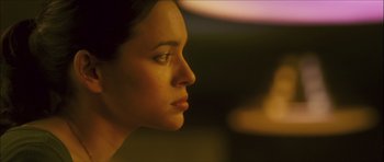 Movie still from “My Blueberry Nights” (2007), directed by Kar-Wai Wong – A woman's face in the dark; Close Up shot, Low angle
