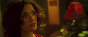 Movie still from “My Blueberry Nights” (2007), directed by Kar-Wai Wong – A person wearing a red shirt; Close Up shot, Over the shoulder angle