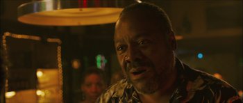 Movie still from “My Blueberry Nights” (2007), directed by Kar-Wai Wong – A person with a beard; Close Up shot, Low angle