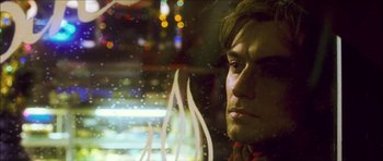 Movie still from “My Blueberry Nights” (2007), directed by Kar-Wai Wong – A person looking out of a car window; Close Up shot, Low angle
