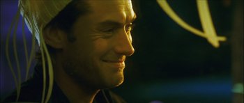 Movie still from “My Blueberry Nights” (2007), directed by Kar-Wai Wong – A man's face in the dark; Close Up shot, Over the shoulder angle