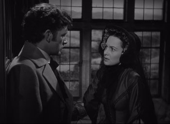 Movie still from “My Cousin Rachel” (1952), directed by Henry Koster – A man and a woman talking to each other; Medium shot, Over the shoulder angle