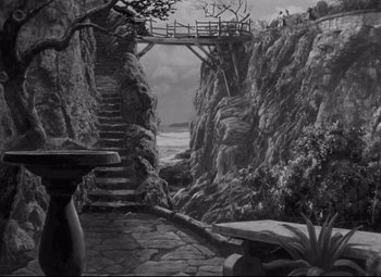 Movie still from “My Cousin Rachel” (1952), directed by Henry Koster – A black and white painting of a bridge over a river; Extreme Wide shot, High angle