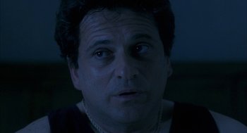 Movie still from “My Cousin Vinny” (1992), directed by Jonathan Lynn – A person wearing a necklace; Close Up shot, Low angle
