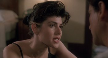 Movie still from “My Cousin Vinny” (1992), directed by Jonathan Lynn – A person wearing a black shirt; Close Up shot, Over the shoulder angle