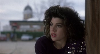 Movie still from “My Cousin Vinny” (1992), directed by Jonathan Lynn – A person wearing a black shirt; Close Up shot, Low angle