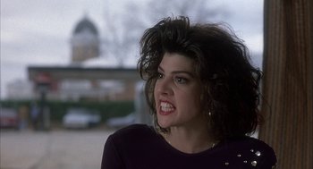 Movie still from “My Cousin Vinny” (1992), directed by Jonathan Lynn – A person wearing a purple shirt; Close Up shot, Low angle