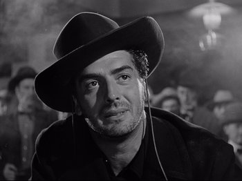 Movie still from “My Darling Clementine” (1946), directed by John Ford – Black and white photograph of a man wearing a cowboy hat; Close Up shot, Low angle