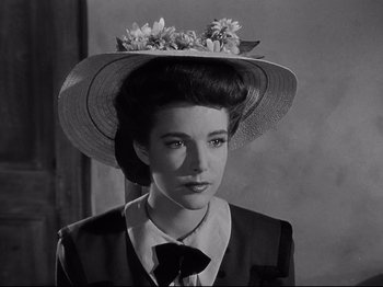 Movie still from “My Darling Clementine” (1946), directed by John Ford – A black and white photo of a woman wearing a hat; Close Up shot, Low angle