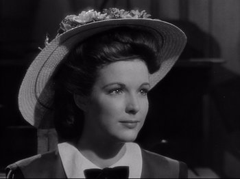 Movie still from “My Darling Clementine” (1946), directed by John Ford – A black and white photo of a woman wearing a hat; Close Up shot, Low angle