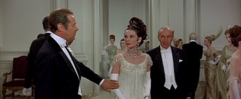 Movie still from “My Fair Lady” (1964), directed by George Cukor – A scene from the movie " breakfast at tiffany's " starring audrey hepburn and sean connery; Medium shot, Over the shoulder angle