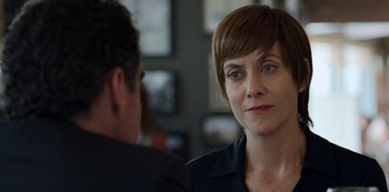 Movie still from “13 Reasons Why” (2017), created by Brian Yorkey – A person with short brown hair; Close Up shot, Over the shoulder angle