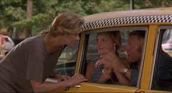 Movie still from “My Father the Hero” (1994), directed by Steve Miner – A woman and two men sitting in a yellow taxi cab; Medium shot, Over the shoulder angle