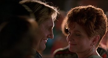 Movie still from “My Father the Hero” (1994), directed by Steve Miner – A man and a woman face to face in the dark; Close Up shot, Low angle