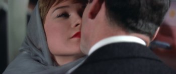 Movie still from “My Geisha” (1962), directed by Jack Cardiff – A man and a woman kissing; Extreme Close Up shot, High angle