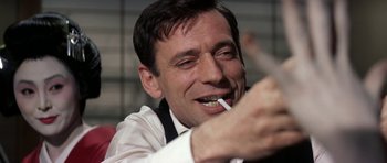 Movie still from “My Geisha” (1962), directed by Jack Cardiff – A person brushing his teeth; Close Up shot, High angle