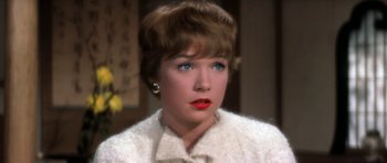 Movie still from “My Geisha” (1962), directed by Jack Cardiff – A person with short hair; Close Up shot, High angle