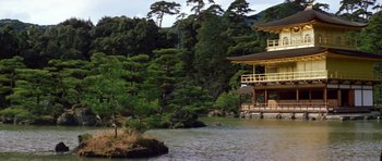 Movie still from “My Geisha” (1962), directed by Jack Cardiff – A pond with a house in the background; Extreme Wide shot, Low angle