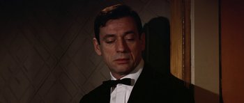Movie still from “My Geisha” (1962), directed by Jack Cardiff – A man in a tuxedo with his eyes closed; Close Up shot, Low angle