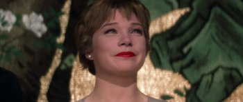 Movie still from “My Geisha” (1962), directed by Jack Cardiff – A person with short brown hair; Close Up shot, Low angle