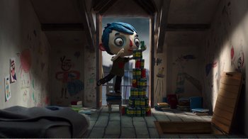 Movie still from “My Life as a Zucchini” (2016), directed by Claude Barras – A cartoon of a boy standing on a stack of blocks; Wide shot, Low angle