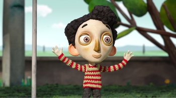 Movie still from “My Life as a Zucchini” (2016), directed by Claude Barras – A cartoon of a person with a striped shirt; Medium shot, Low angle