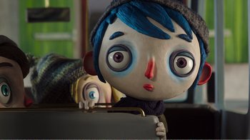 Movie still from “My Life as a Zucchini” (2016), directed by Claude Barras – A doll with blue hair; Close Up shot, Over the shoulder angle