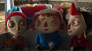 Movie still from “My Life as a Zucchini” (2016), directed by Claude Barras – A stuffed toy with other stuffed toys in the background; Close Up shot, Low angle