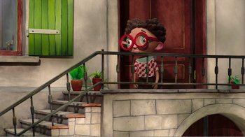 Movie still from “My Life as a Zucchini” (2016), directed by Claude Barras – A cartoon of a person with red glasses looking out of a window; Wide shot, Low angle