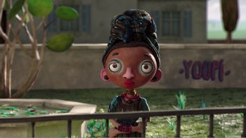 Movie still from “My Life as a Zucchini” (2016), directed by Claude Barras – A cartoon of a woman with a head scarf on; Close Up shot, Low angle