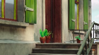 Movie still from “My Life as a Zucchini” (2016), directed by Claude Barras – A potted plant sitting in front of a door; Wide shot, Low angle