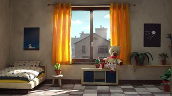 Movie still from “My Life as a Zucchini” (2016), directed by Claude Barras – A teddy bear sitting on top of a bench in front of a window; Extreme Wide shot, High angle
