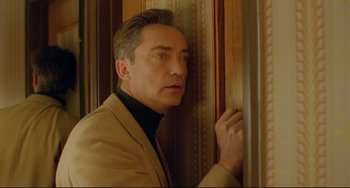 Movie still from “My Own Private Idaho” (1991), directed by Gus Van Sant – A person leaning against a wall; Close Up shot, Low angle