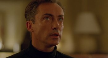 Movie still from “My Own Private Idaho” (1991), directed by Gus Van Sant – A person looking at the camera; Close Up shot, Low angle