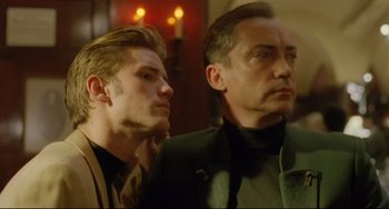 Movie still from “My Own Private Idaho” (1991), directed by Gus Van Sant – A man and a man standing next to each other; Close Up shot, Low angle