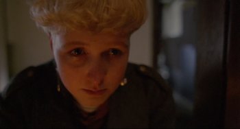 Movie still from “My Own Private Idaho” (1991), directed by Gus Van Sant – A person wearing a jacket; Close Up shot, High angle