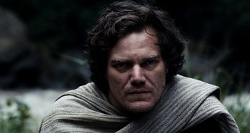 Movie still from “My Son, My Son, What Have Ye Done” (2009), directed by Werner Herzog – A person wearing a scarf; Close Up shot, Low angle