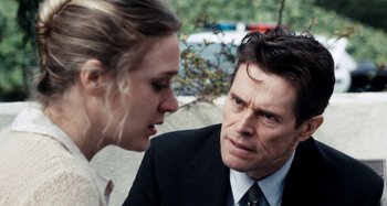 Movie still from “My Son, My Son, What Have Ye Done” (2009), directed by Werner Herzog – A man and a woman talking to each other outside; Close Up shot, Over the shoulder angle