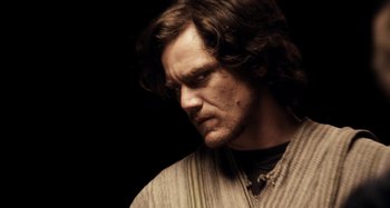 Movie still from “My Son, My Son, What Have Ye Done” (2009), directed by Werner Herzog – A person with long dark hair; Close Up shot, Low angle