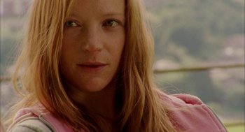 Movie still from “My Summer of Love” (2004), directed by Pawel Pawlikowski – A person with long blonde hair; Close Up shot, Low angle
