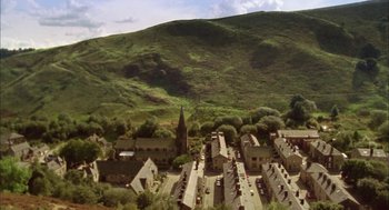 Movie still from “My Summer of Love” (2004), directed by Pawel Pawlikowski – An aerial view of a small town in the mountains; Extreme Wide shot, High angle
