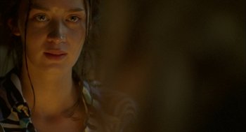 Movie still from “My Summer of Love” (2004), directed by Pawel Pawlikowski – A young woman is looking into the camera; Close Up shot, Over the shoulder angle