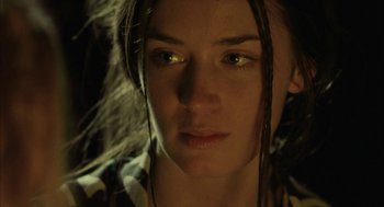 Movie still from “My Summer of Love” (2004), directed by Pawel Pawlikowski – A woman's face with green eyes; Close Up shot, Low angle