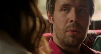 Movie still from “My Summer of Love” (2004), directed by Pawel Pawlikowski – A man looking at a woman's face; Close Up shot, Over the shoulder angle